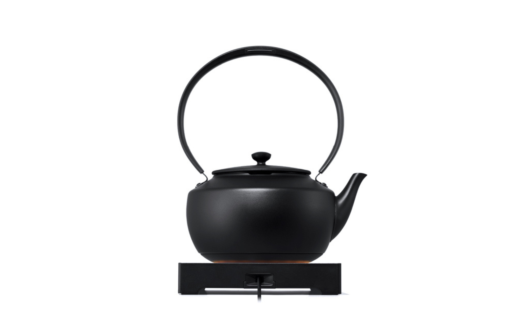 Black electric kettle with arched handle, knob lid, and pour spout on base.