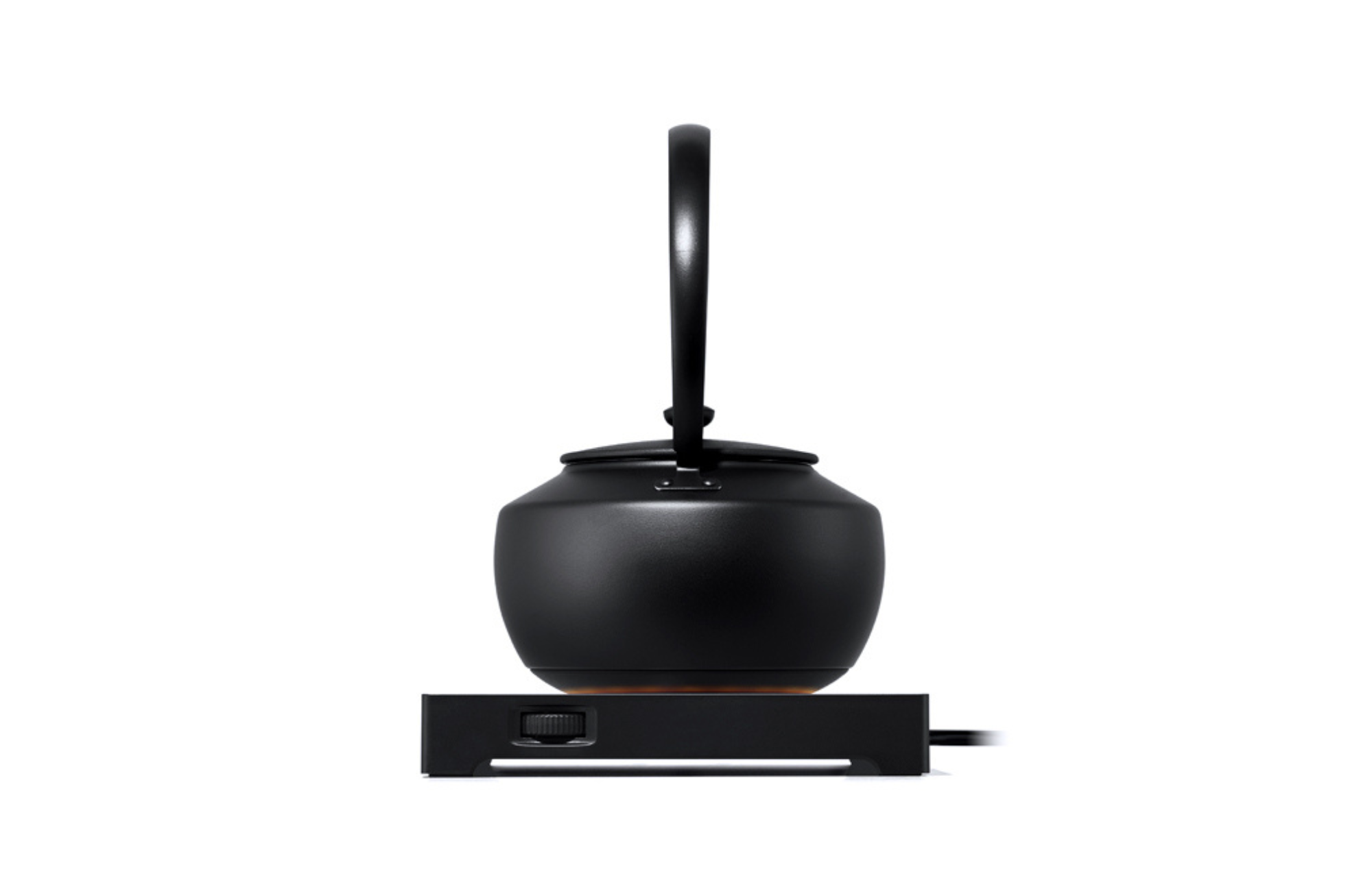 Black electric kettle with vertical LED light bar on base.