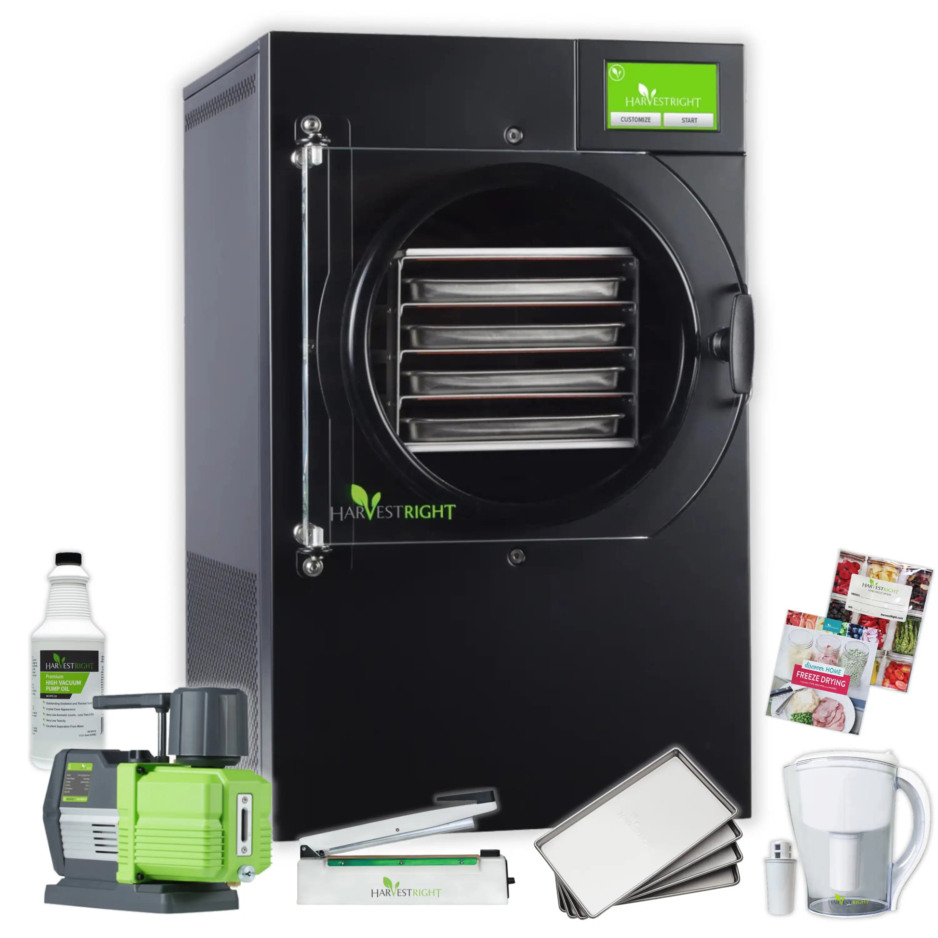 Black freeze dryer with vacuum chamber and included green pump, trays, and accessories