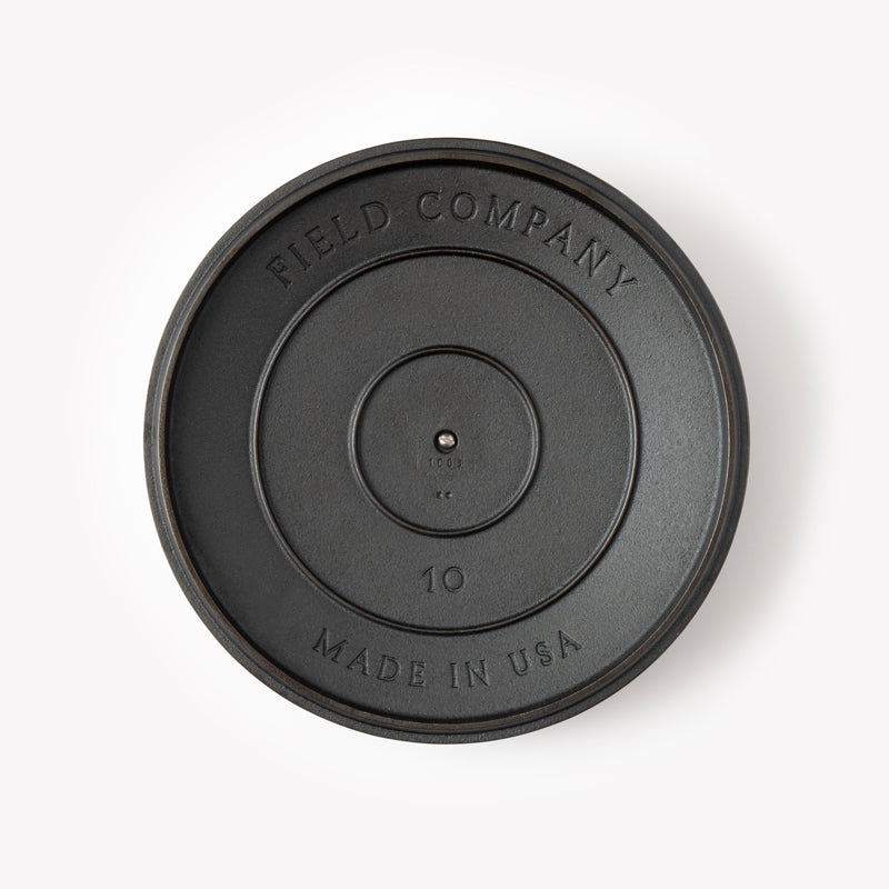 Embossed cast iron lid underside with “FIELD COMPANY,” “MADE IN USA,” and “10”