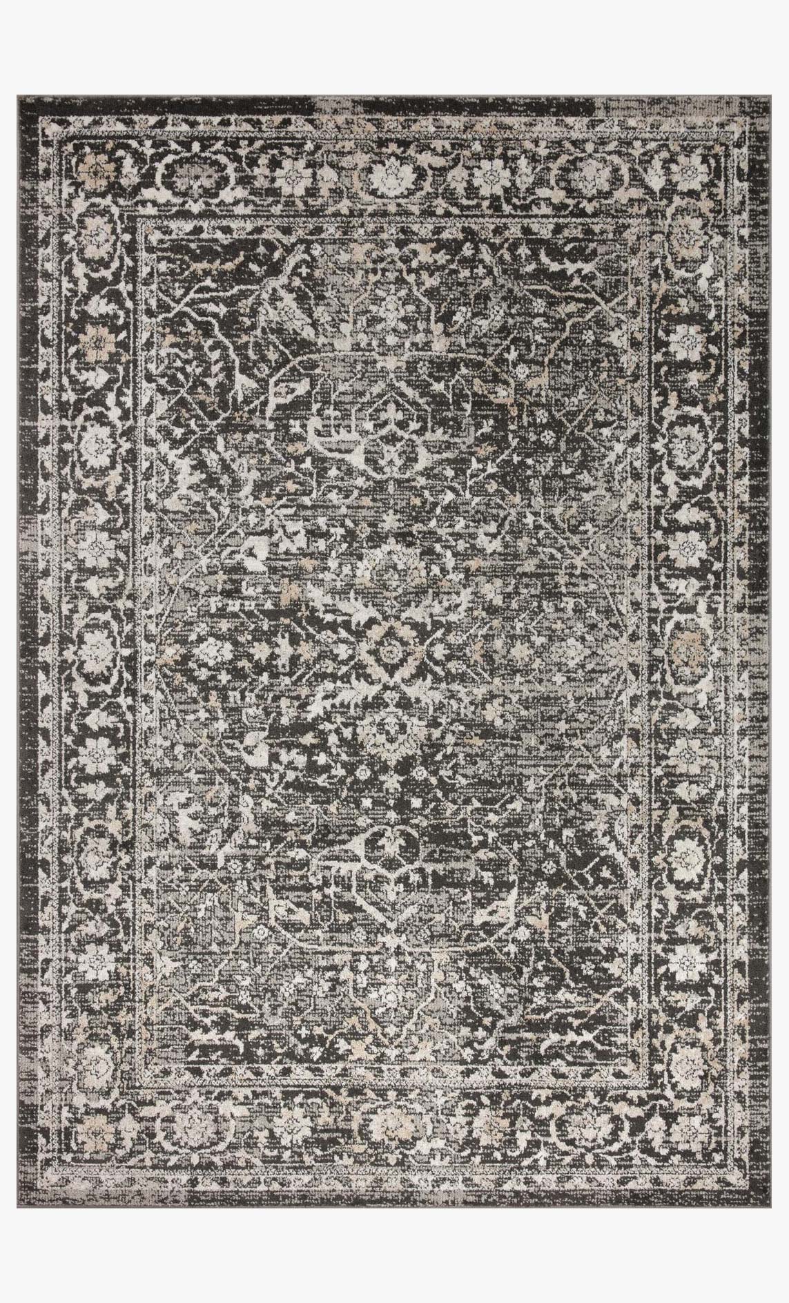 Traditional rug in charcoal and silver with ornate distressed border and center design