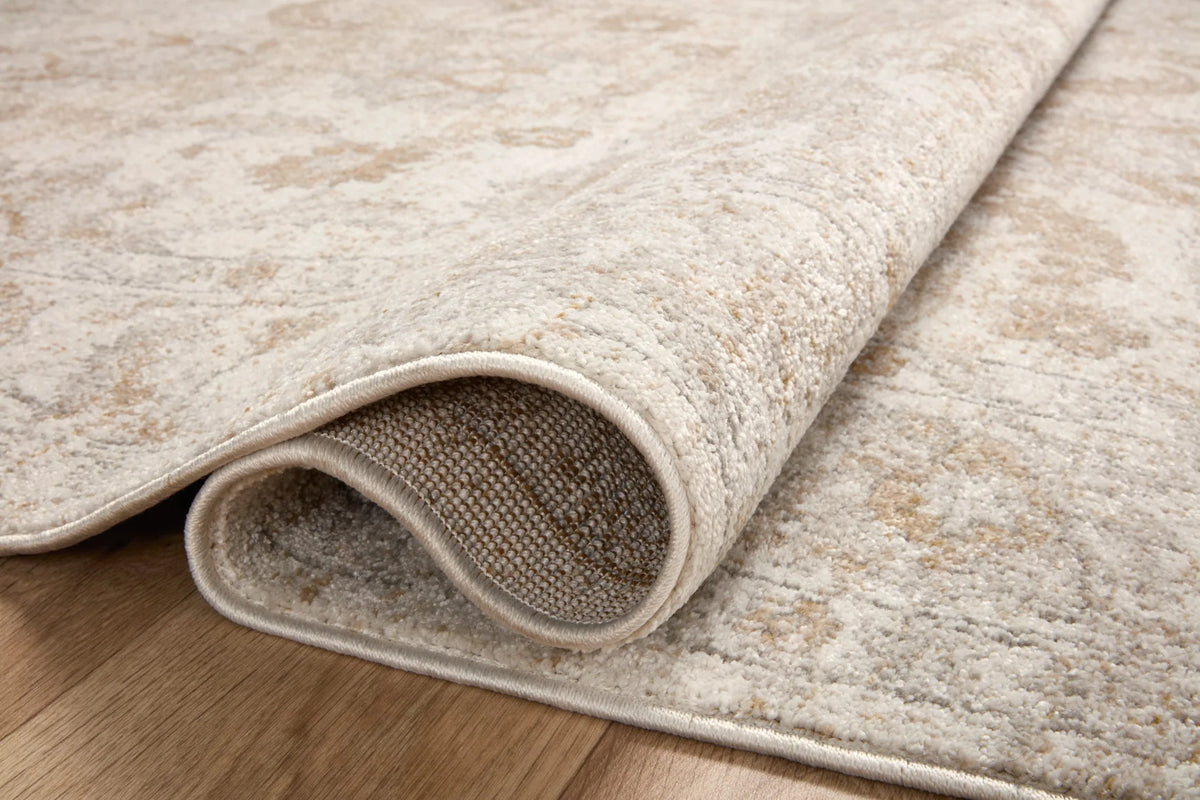 Ivory and beige runner rug with rolled edge, showing low-pile texture