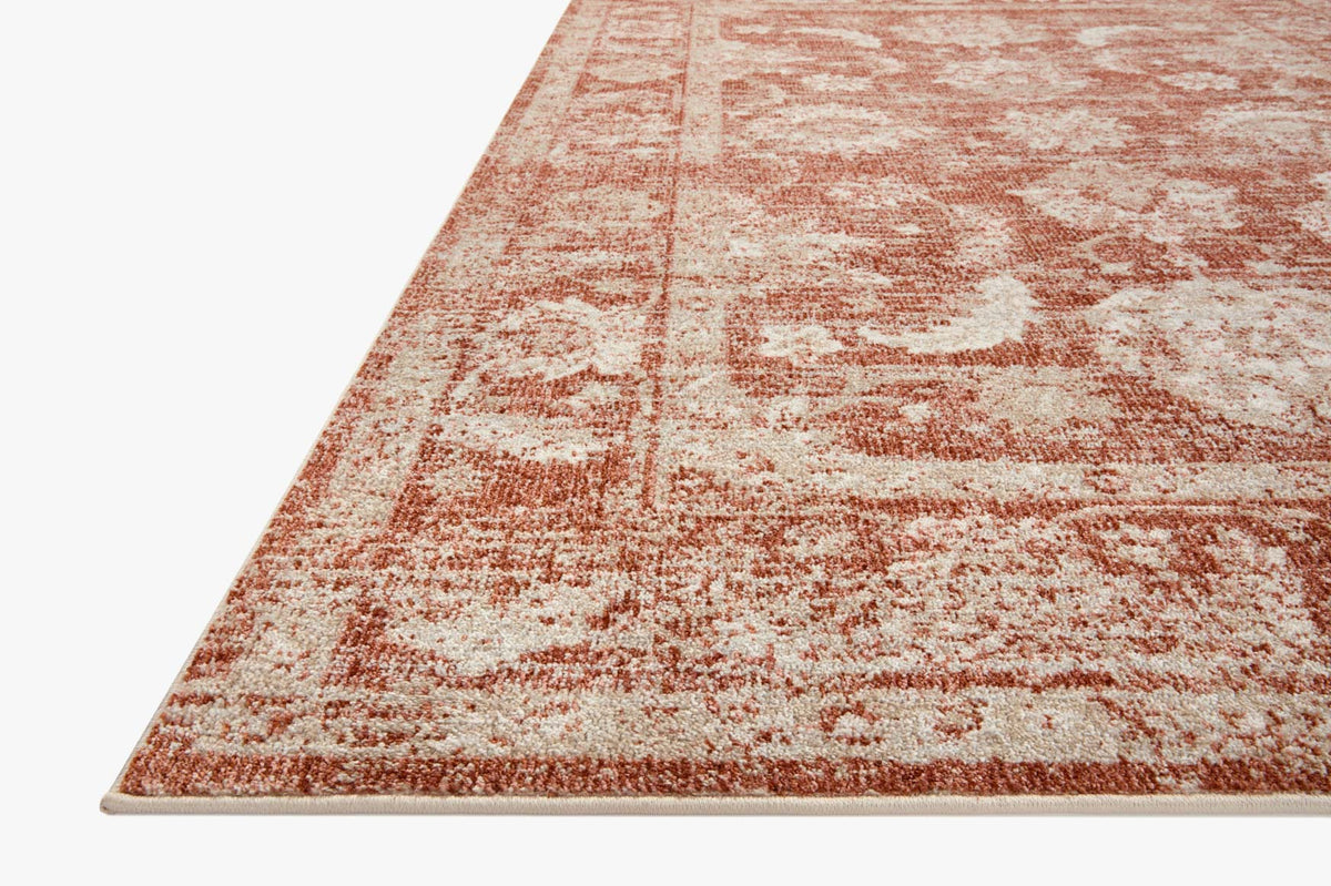 Rust and ivory traditional area rug with distressed pattern and flat woven border