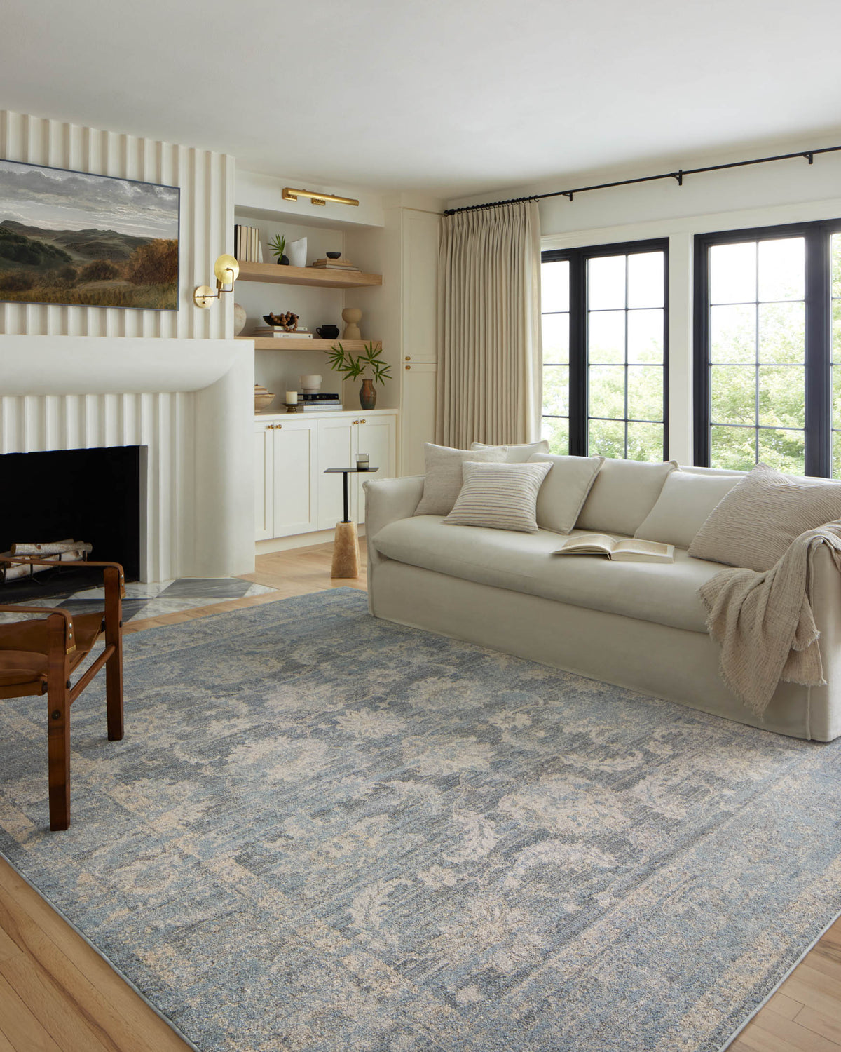 Sky and beige traditional runner rug with distressed motifs and subtle border