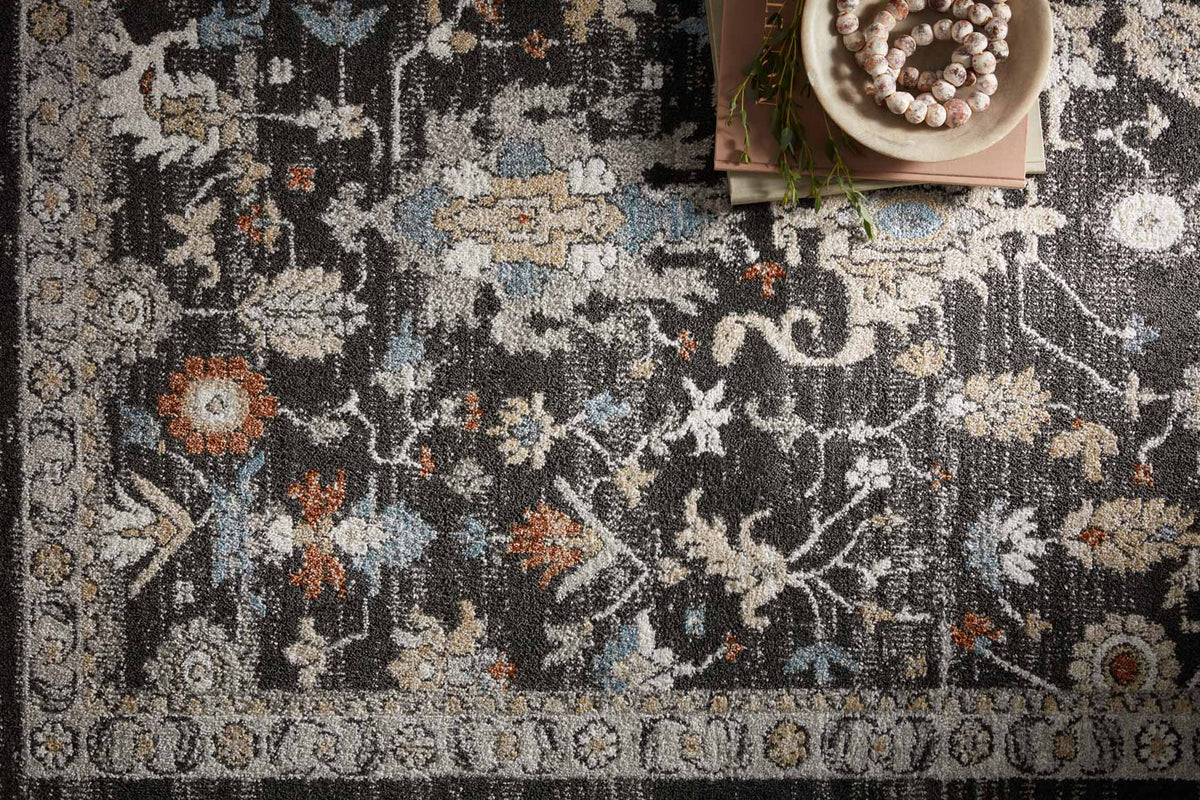 Charcoal traditional rug texture with detailed medallion and distressed blue and orange accents