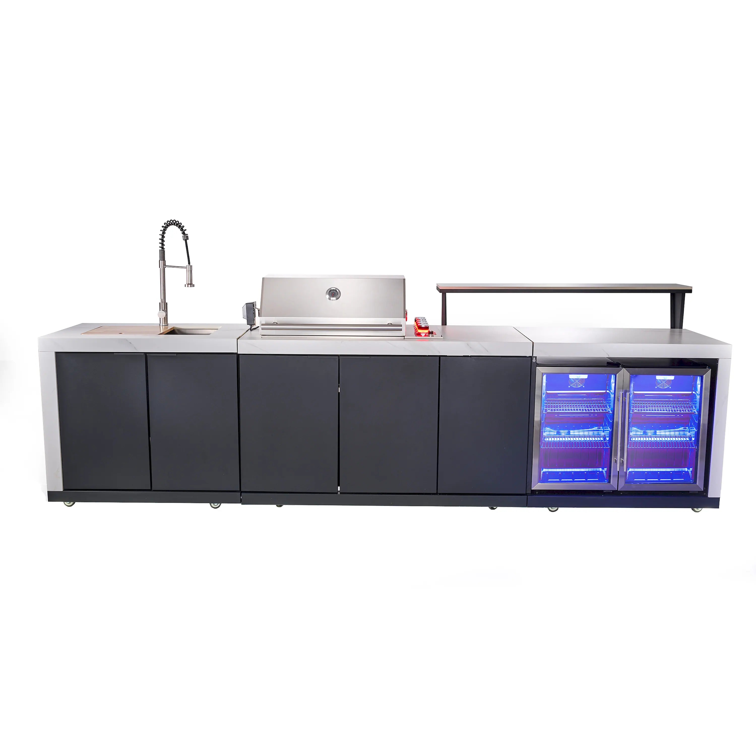 Outdoor BBQ grill island with glowing beverage center windows and stainless countertop surfaces.