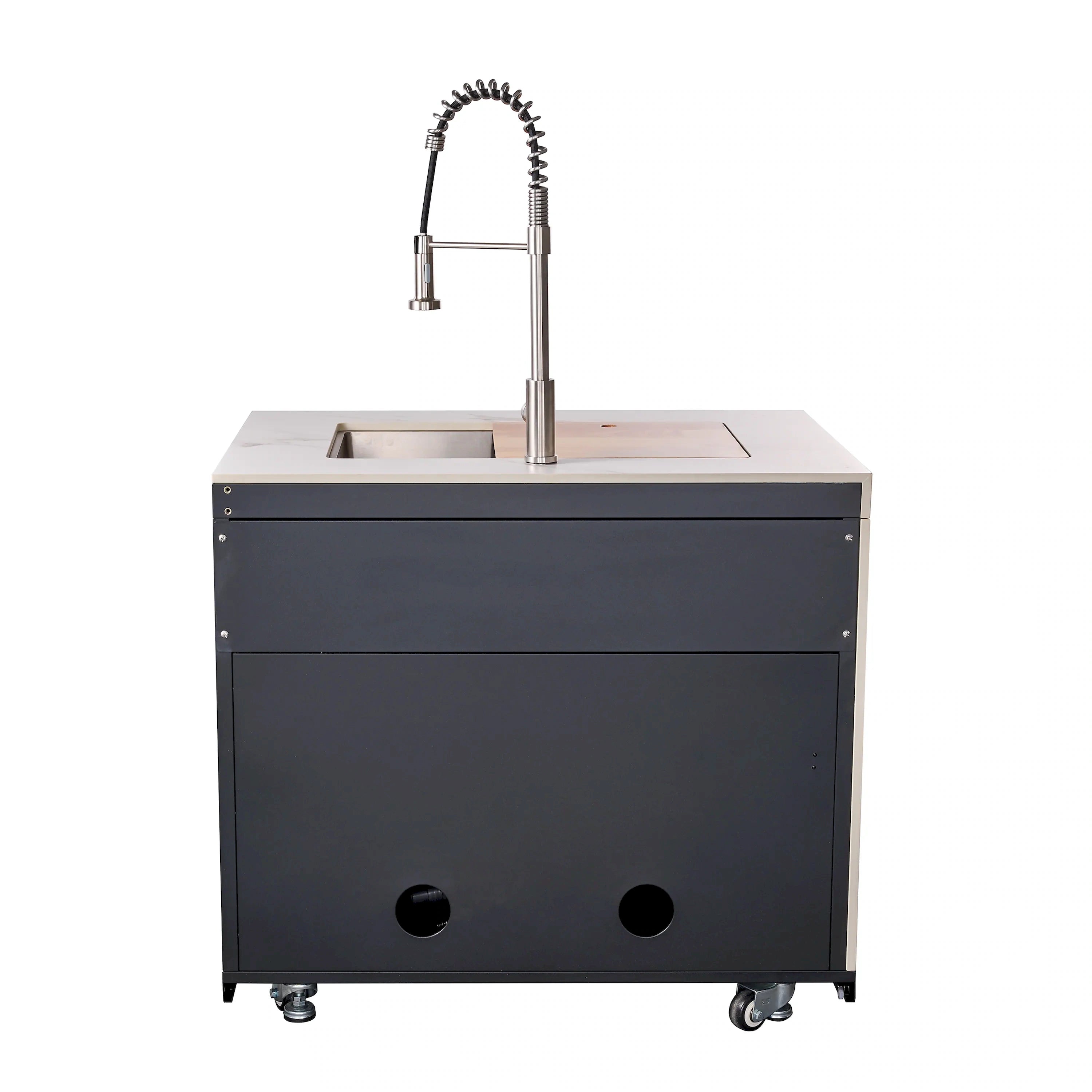 Outdoor kitchen sink cabinet with chrome faucet and stainless basin on white countertop.