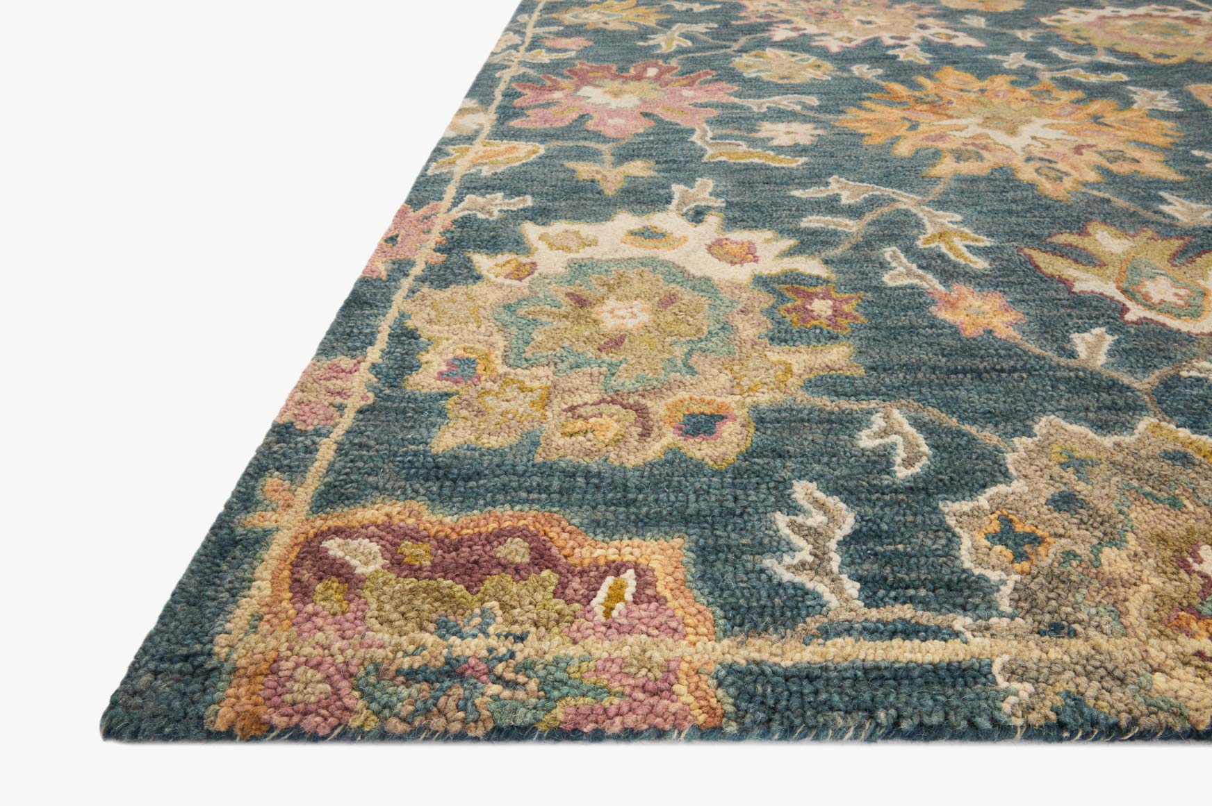 Transitional area rug with navy background and multicolor floral medallion pattern, 8x12 size
