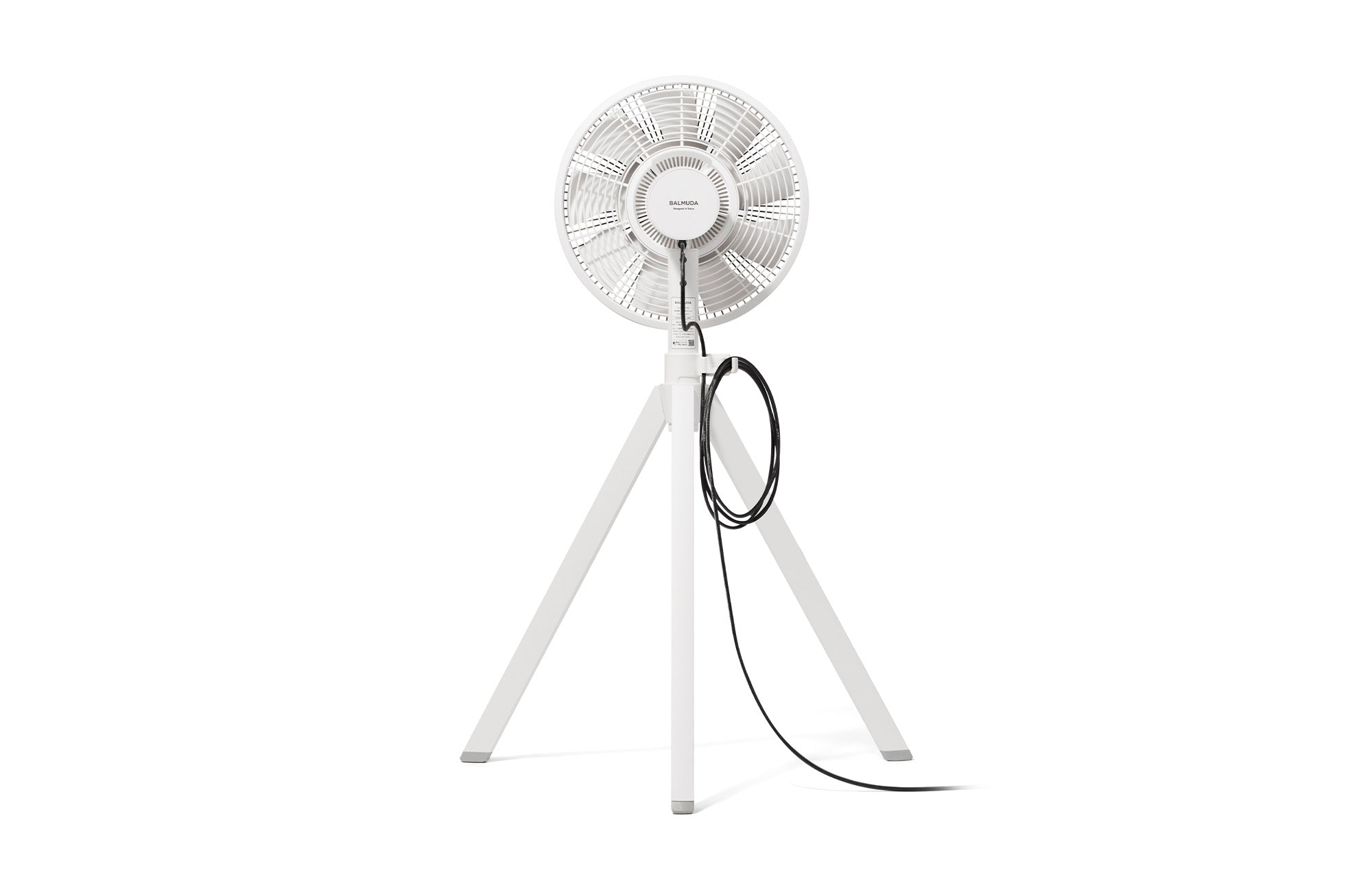 White 12-inch portable fan front view with circular grille and tripod legs