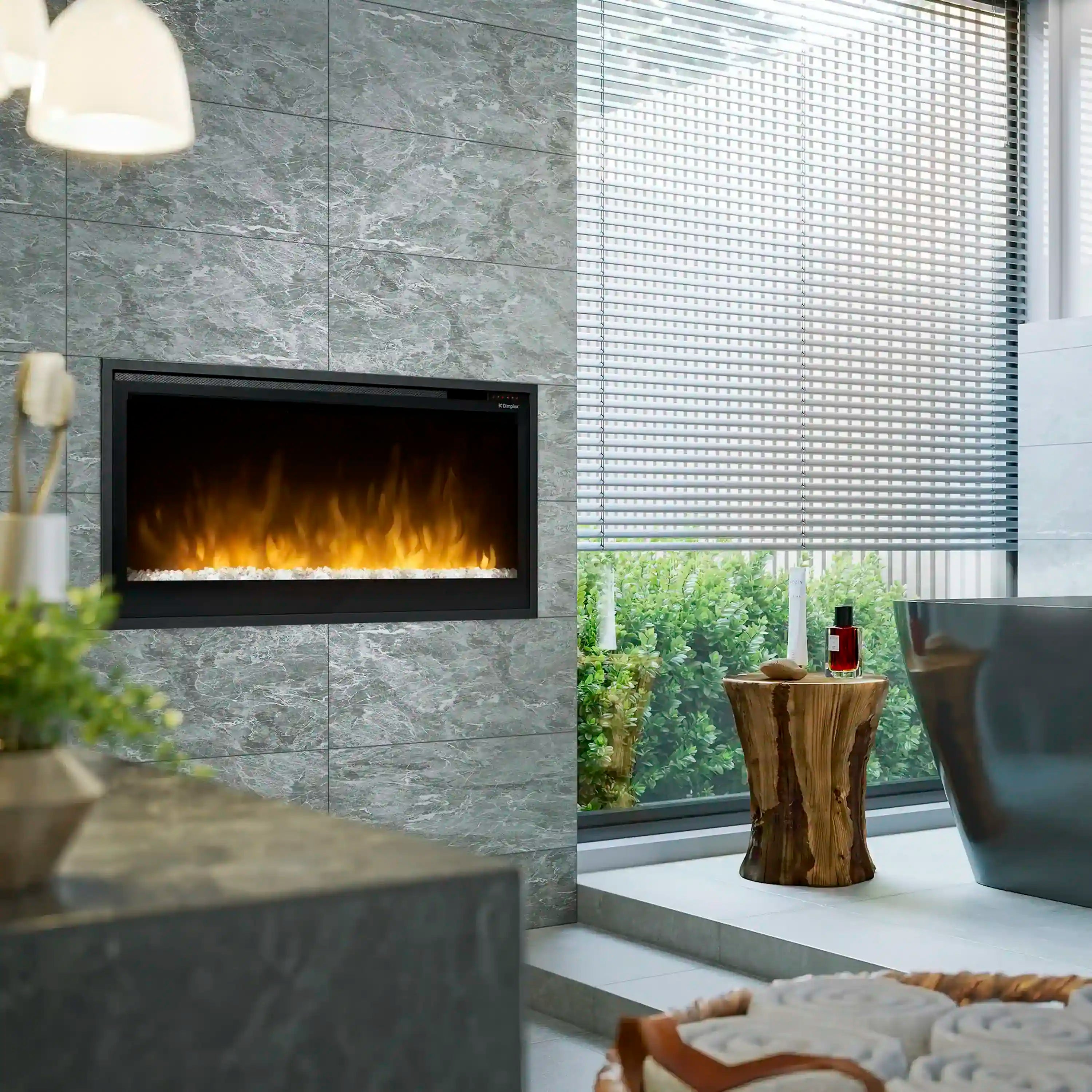 Recessed slim linear electric fireplace with black frame and flame window on stone wall