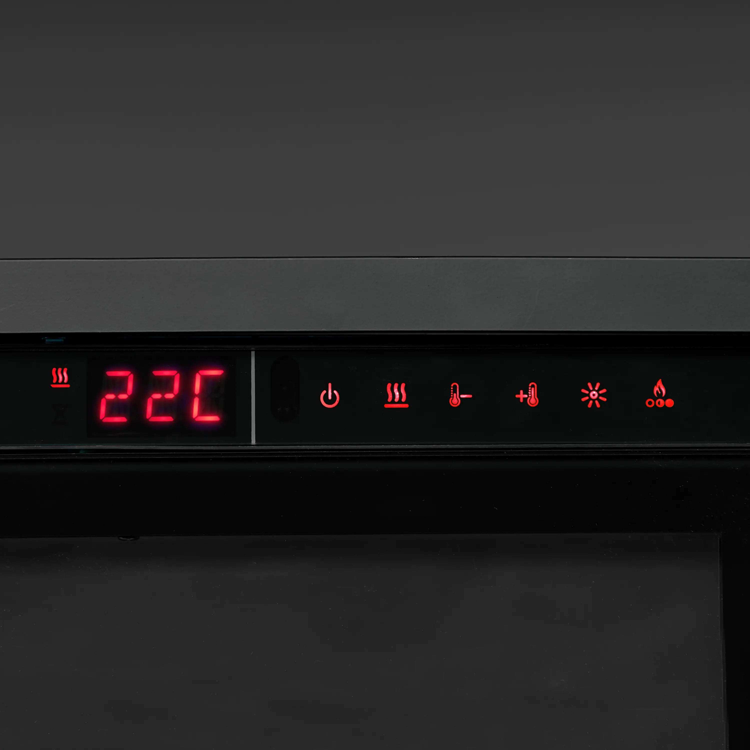 Black control panel with red LED temperature display and icons on built-in fireplace
