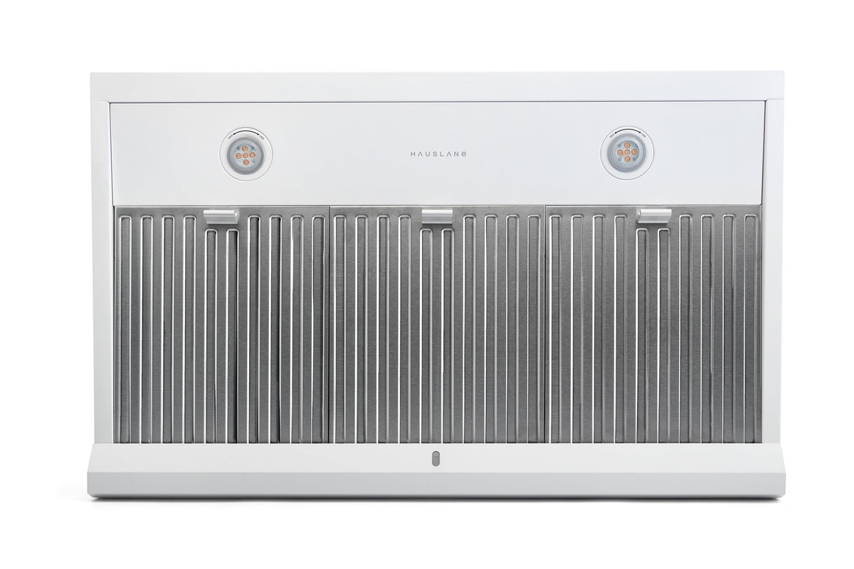 Matte white under-cabinet range hood with vented grille and two circular LED lights