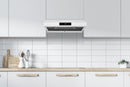Matte white under-cabinet range hood with control panel and vent grille beneath.