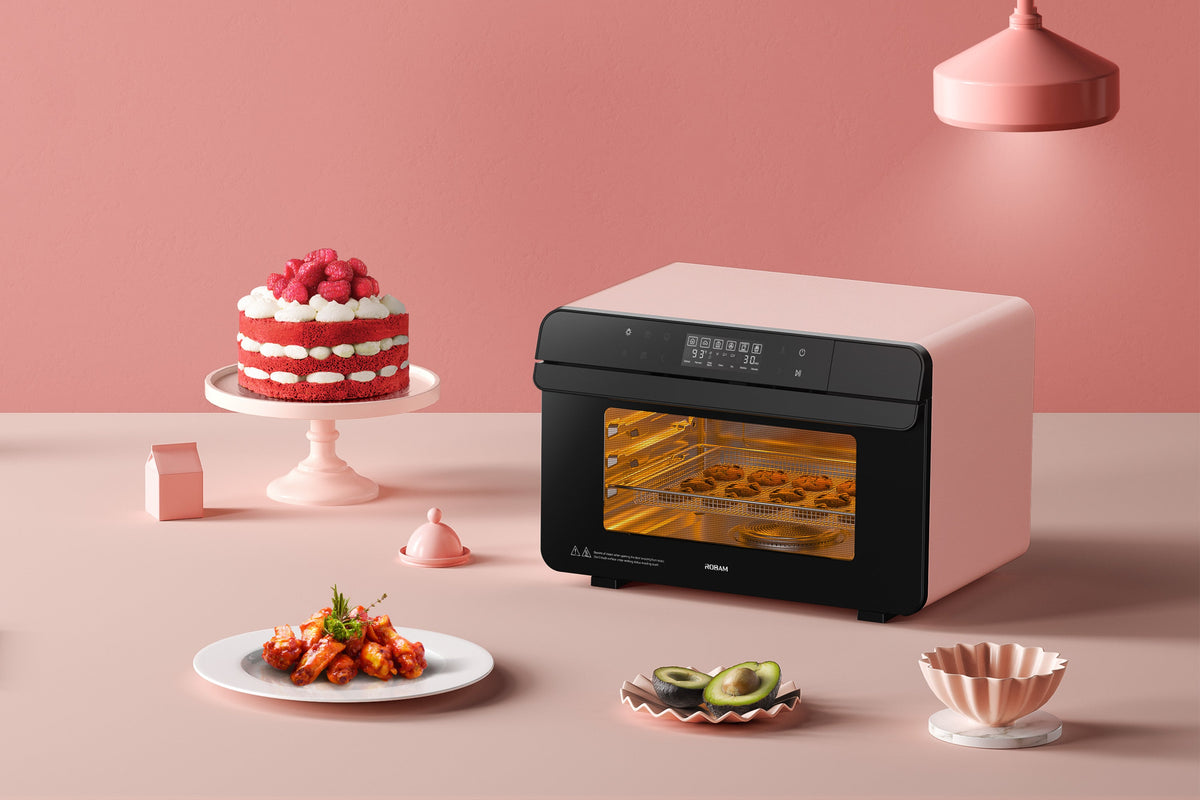 ROBAM combi steam oven with pink exterior on countertop, black control bar visible