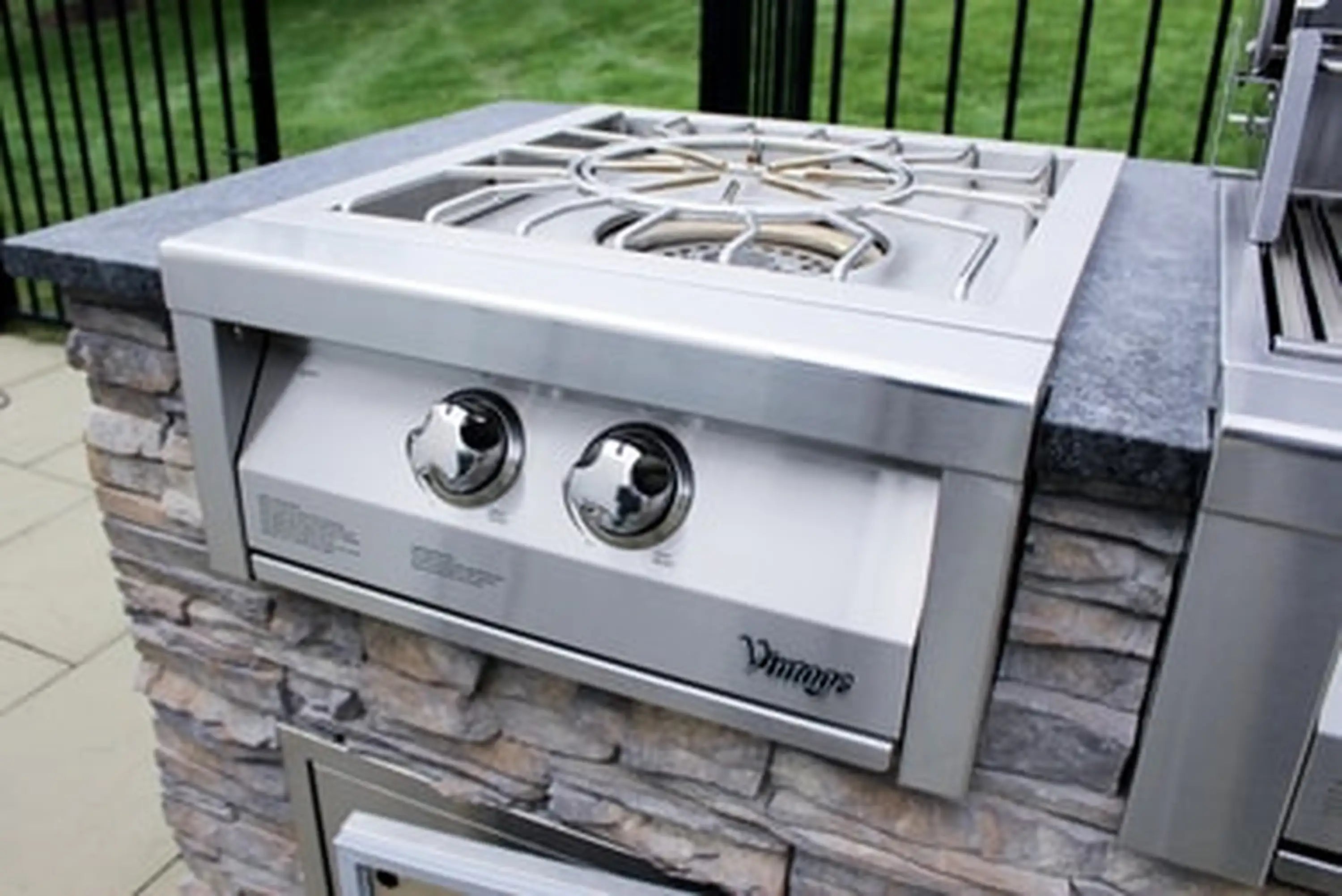 Stainless outdoor 24-inch gas burner with open burner grate and two front knobs