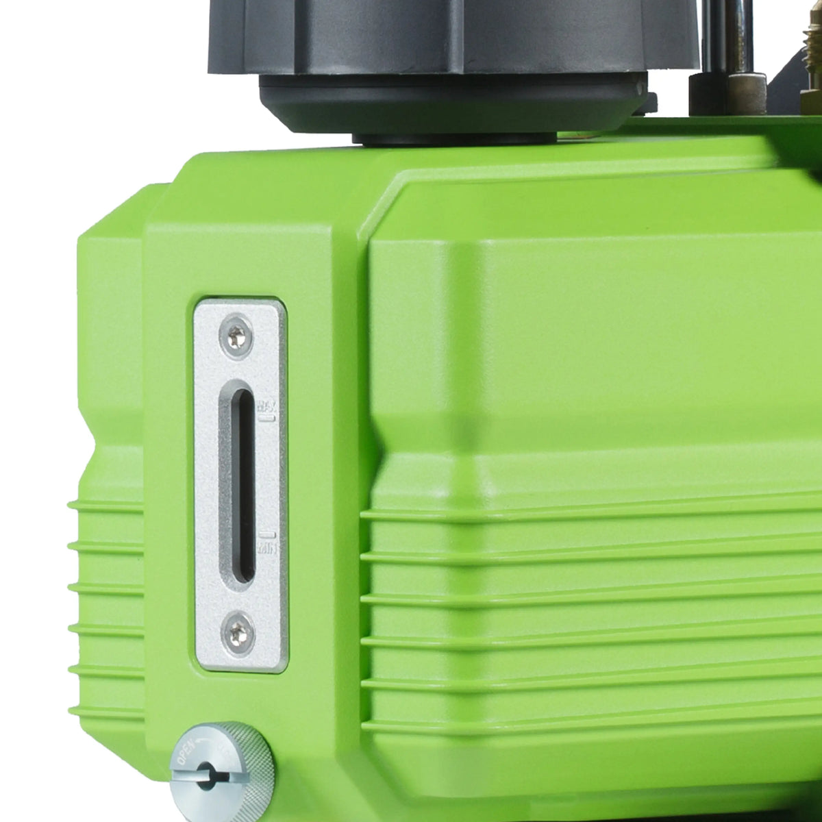 Green industrial pump close-up of front panel port and round adjustment knob