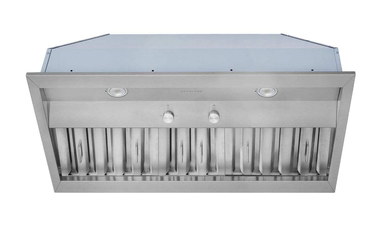 Stainless steel range hood insert showing front vent louvers and two central control knobs.