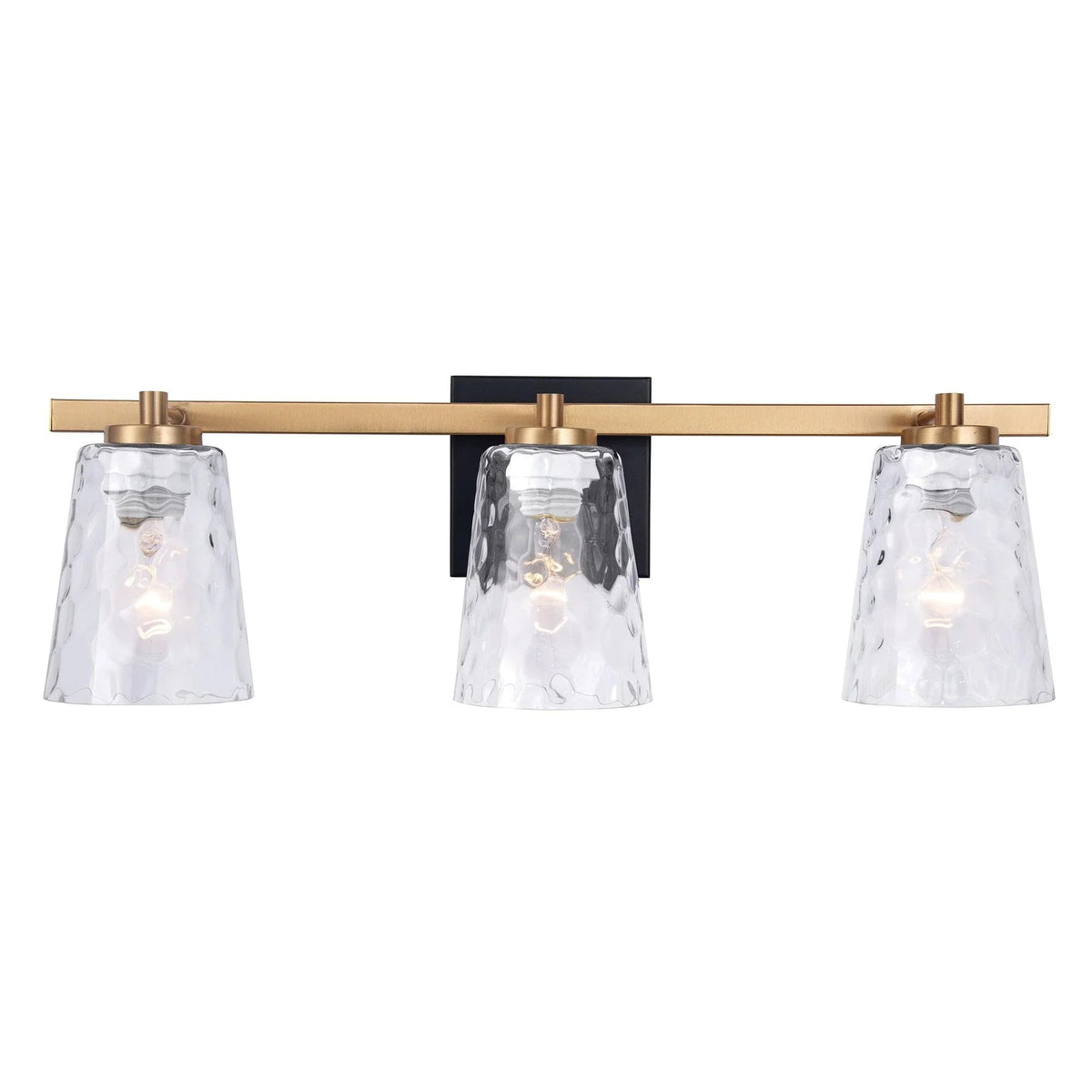 3-light vanity light with gold bar, black center bracket, and clear textured glass shades.