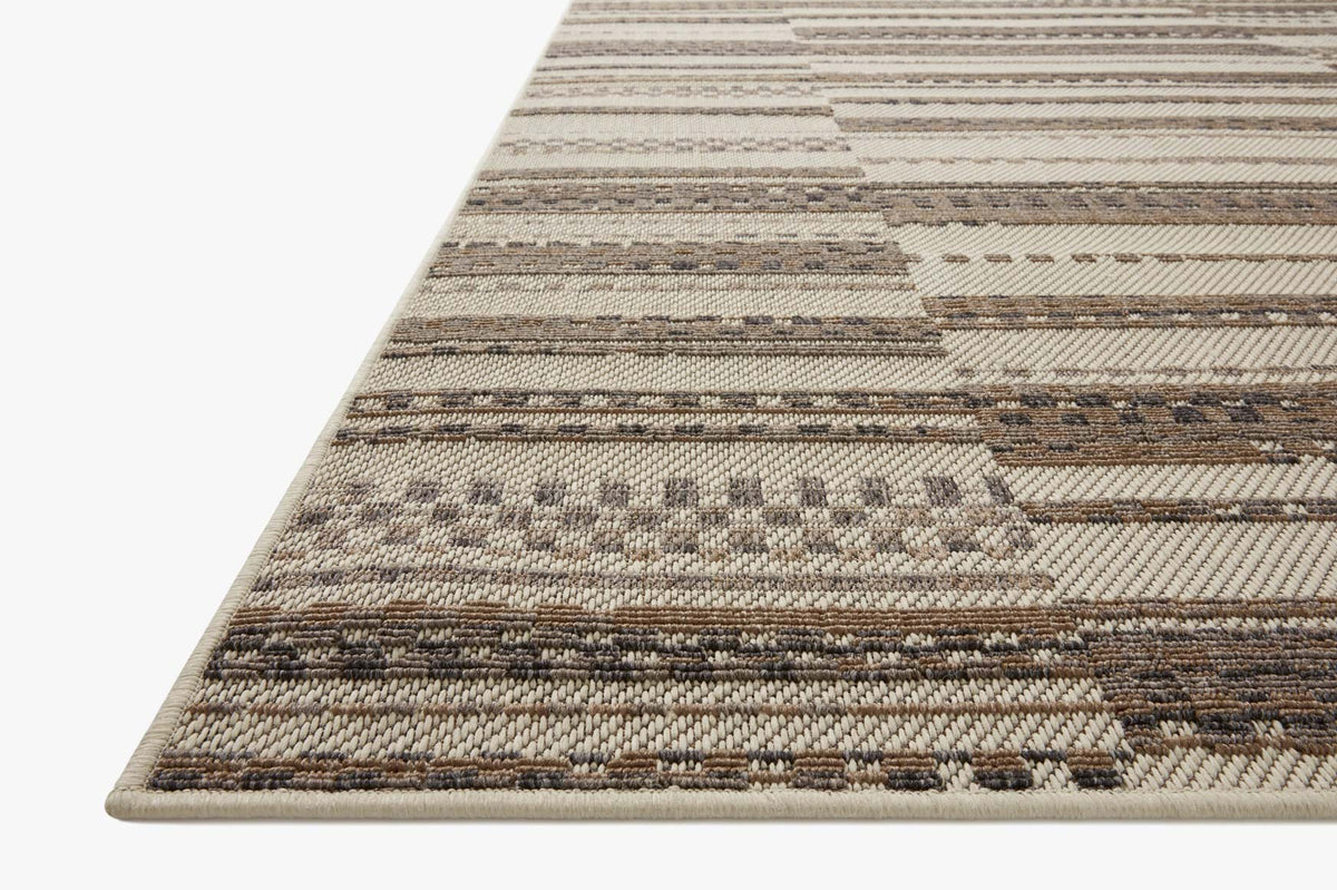 Ivory and taupe indoor/outdoor rug with striped flatweave pattern and stitched border