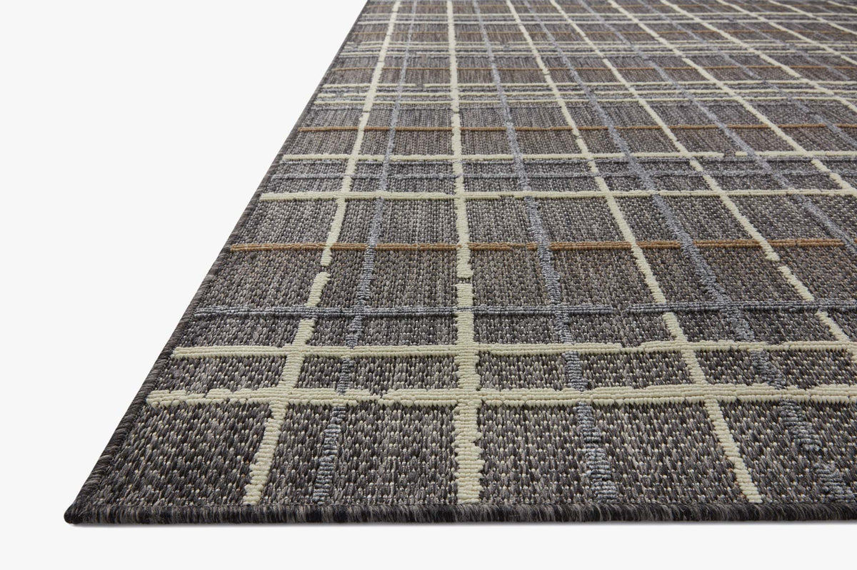 Charcoal area rug with cream and tan grid pattern, flatwoven texture