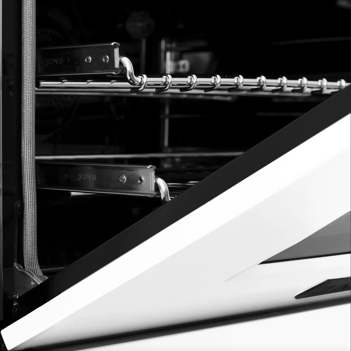 Electric oven interior with wire rack and chrome rails