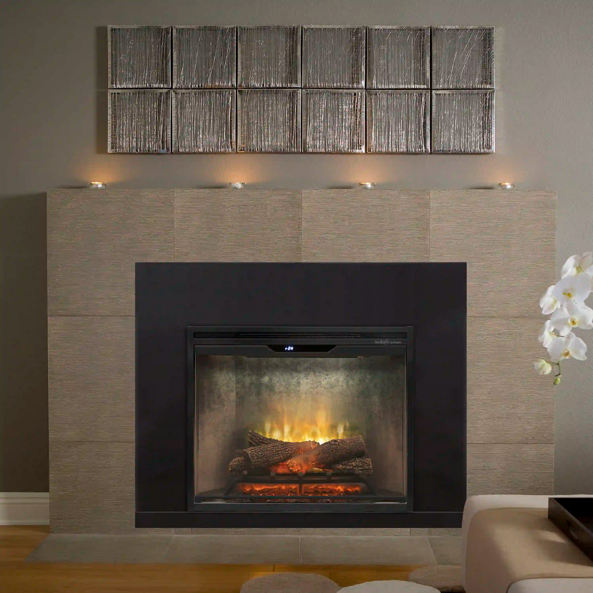 Black fireplace surround trim with glass firebox opening and inner frame