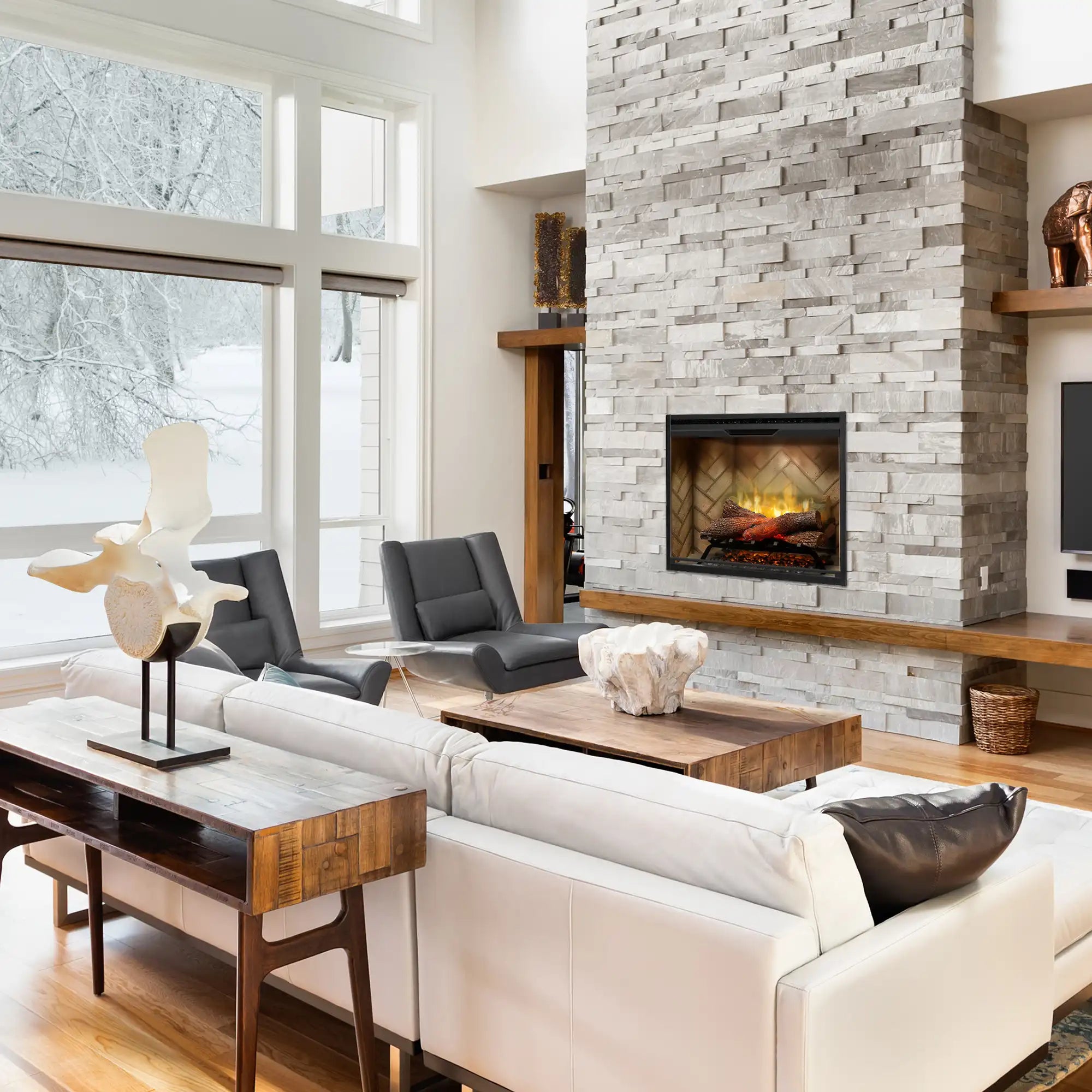 Built-in electric firebox with flame-and-log display in stone fireplace surround