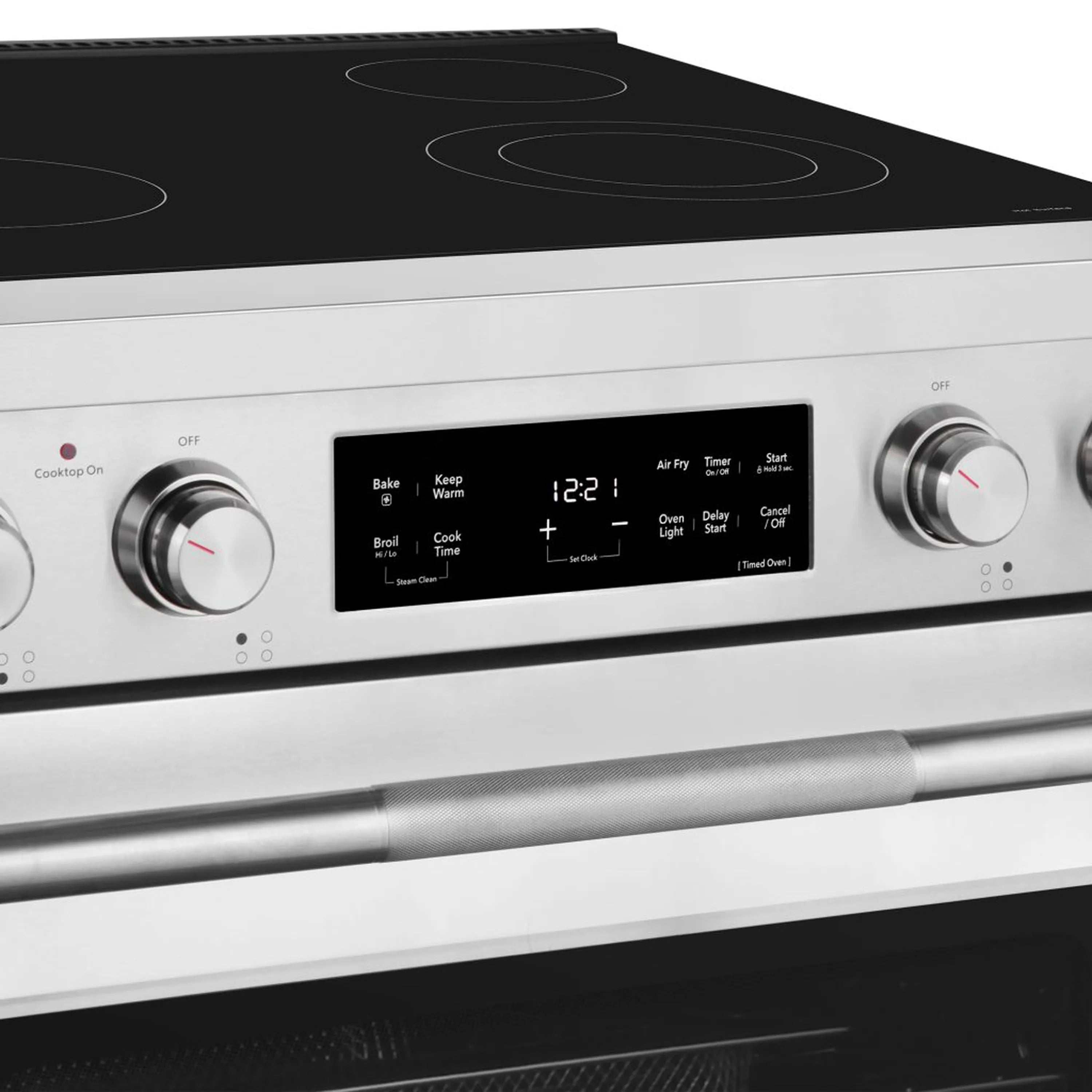 Electric range control panel with knobs and digital display above black cooktop