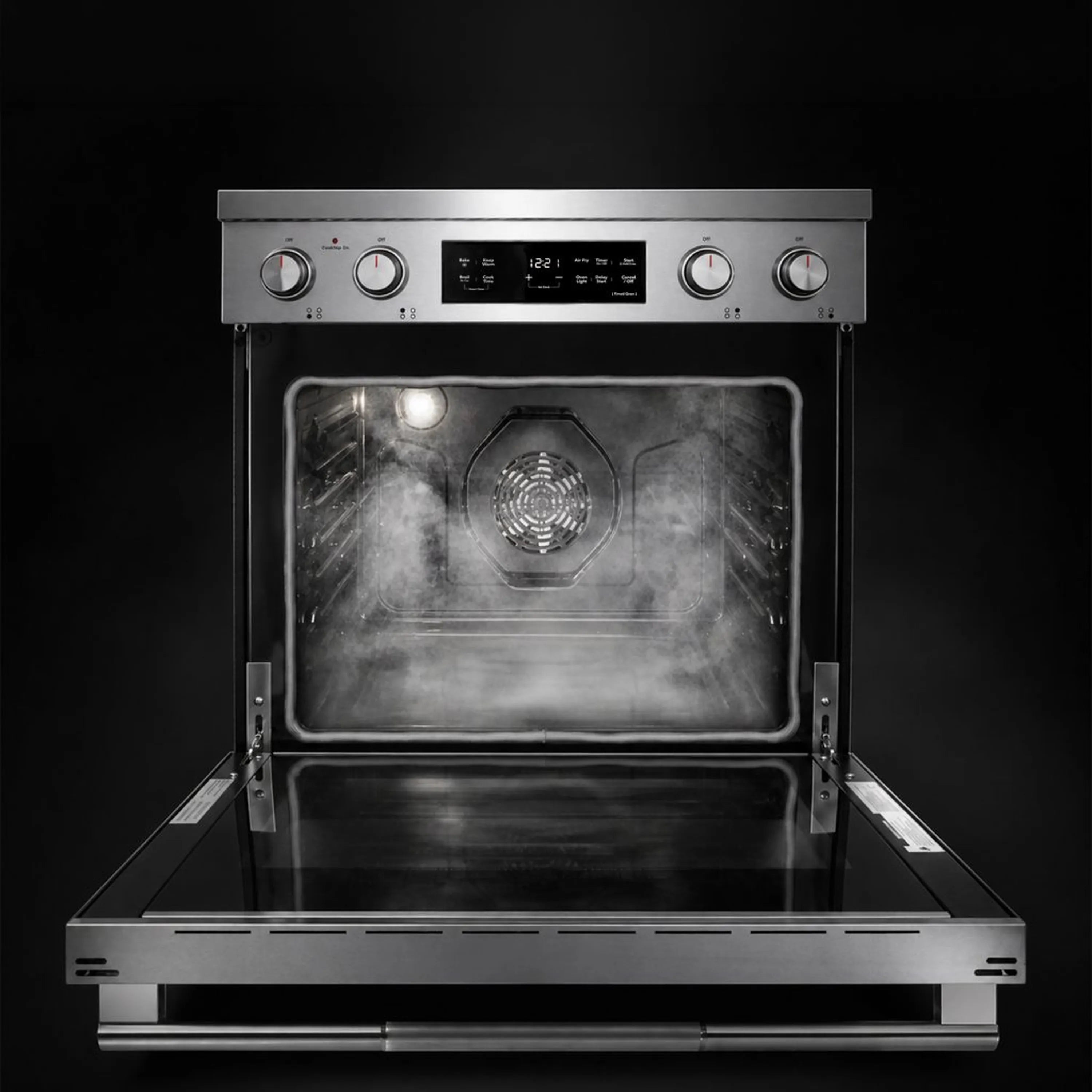 Electric range oven interior with broiler area and racks visible through open door