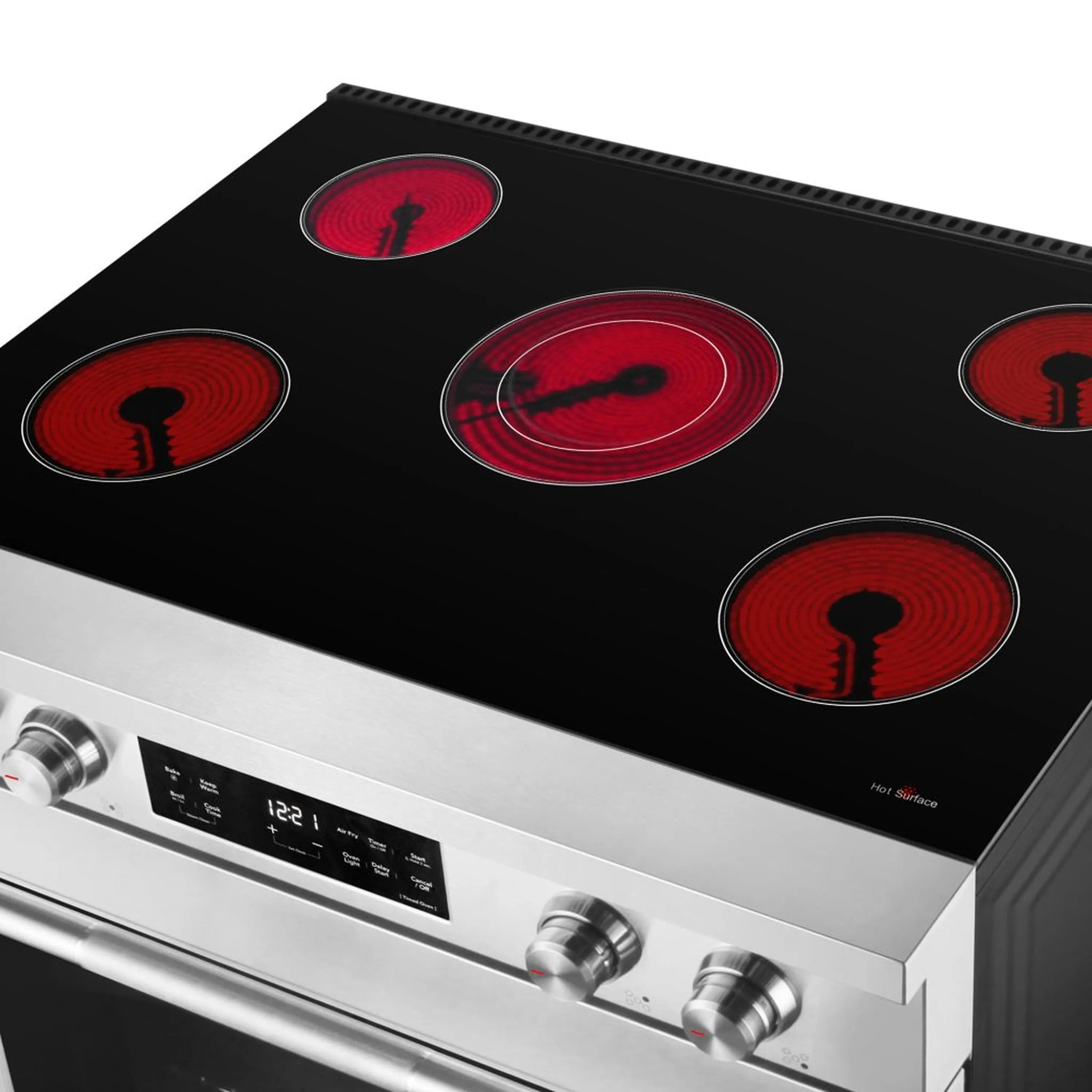 Black glass electric cooktop with four red coil burner rings and control area