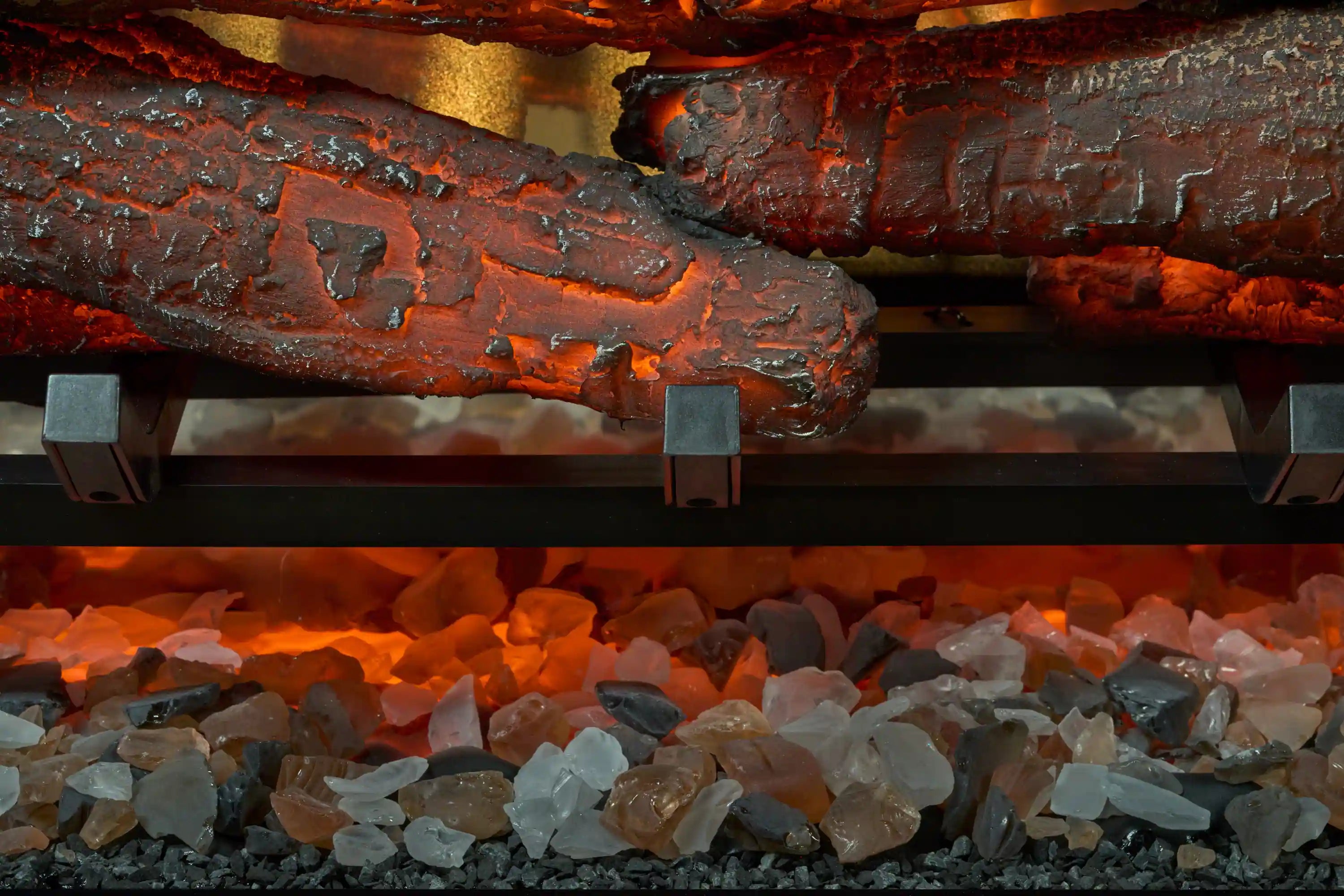 Dimplex Revillusion firebox interior close-up: glowing logs over ember bed
