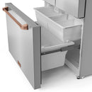 Counter-depth refrigerator freezer drawer open with rose-gold handle and interior bins