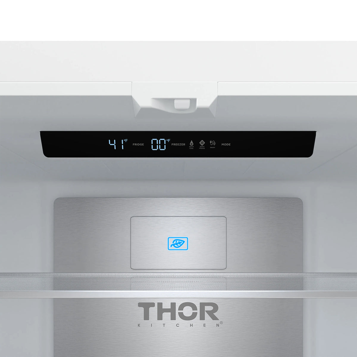 White refrigerator control panel and display area above the door interior, with THOR branding.