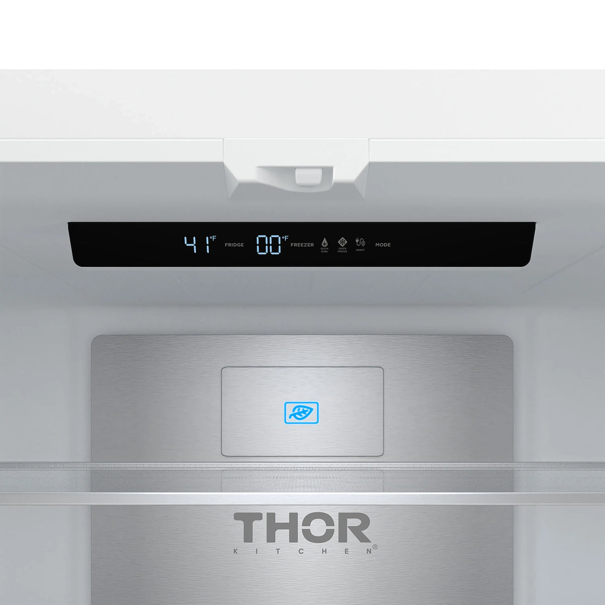 White refrigerator control panel and display area above the door interior, with THOR branding.