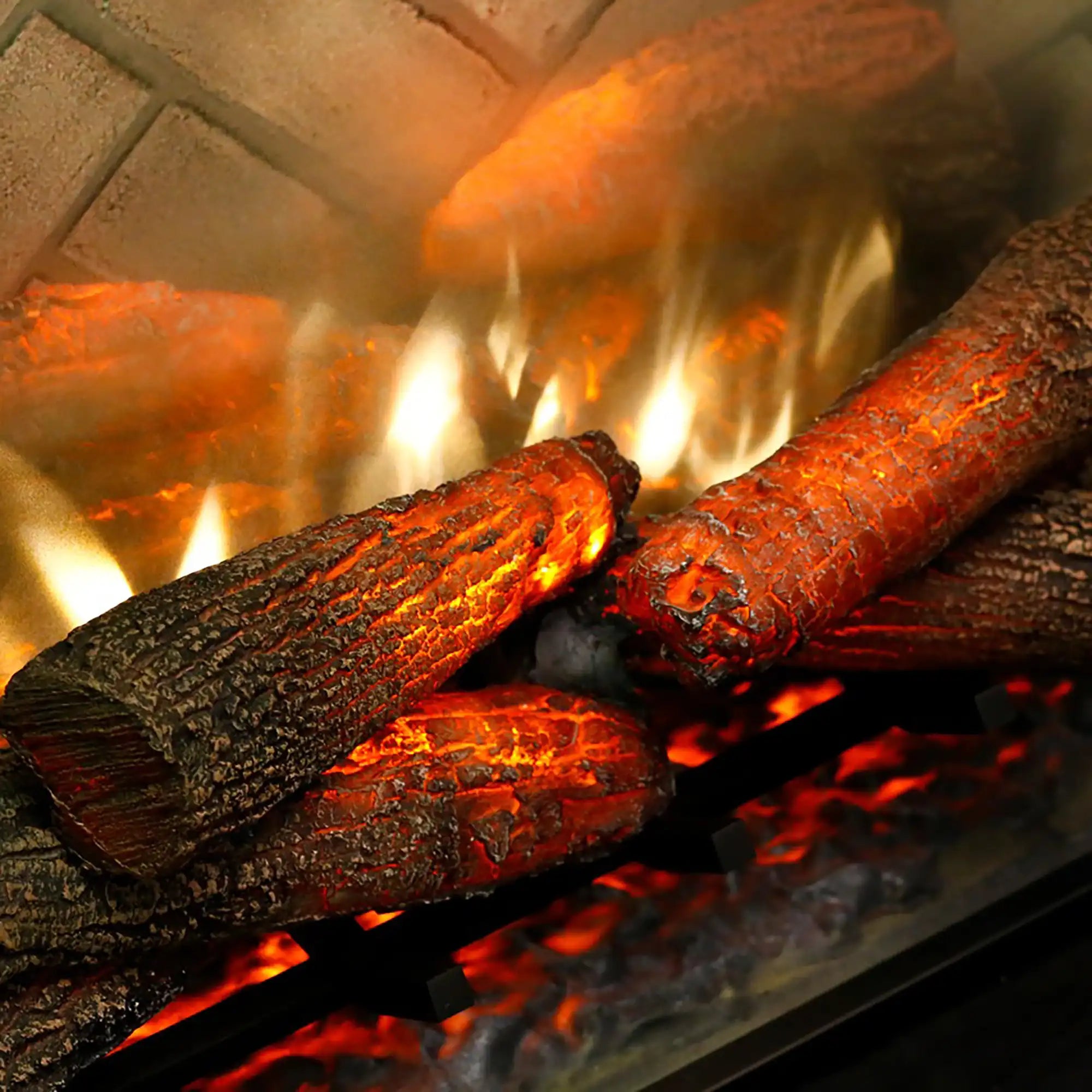 Electric fire display with glowing faux logs and red-orange embers