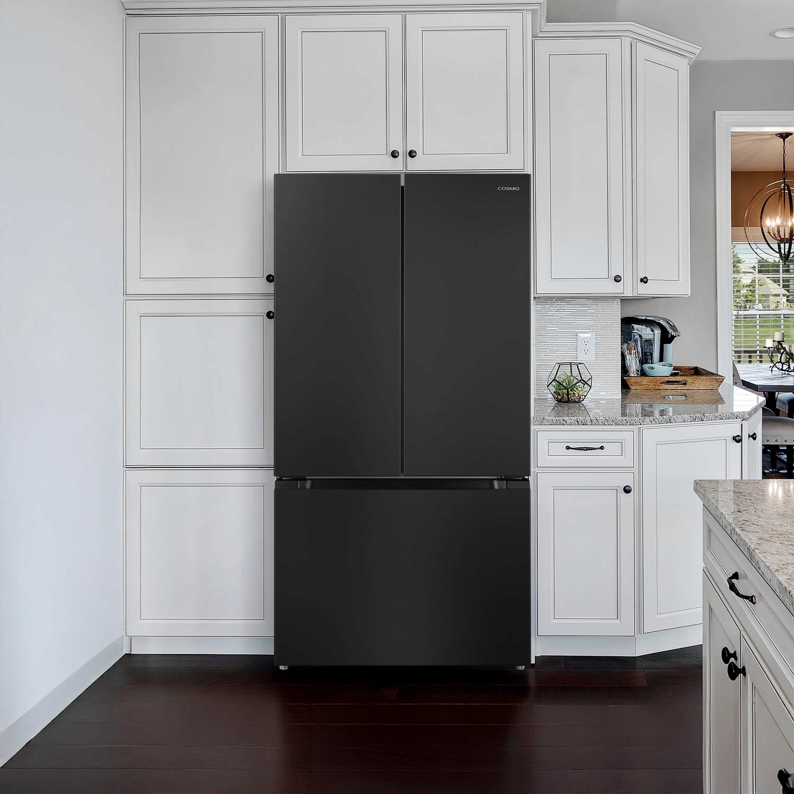 Matte black two-door refrigerator with top and bottom doors closed.