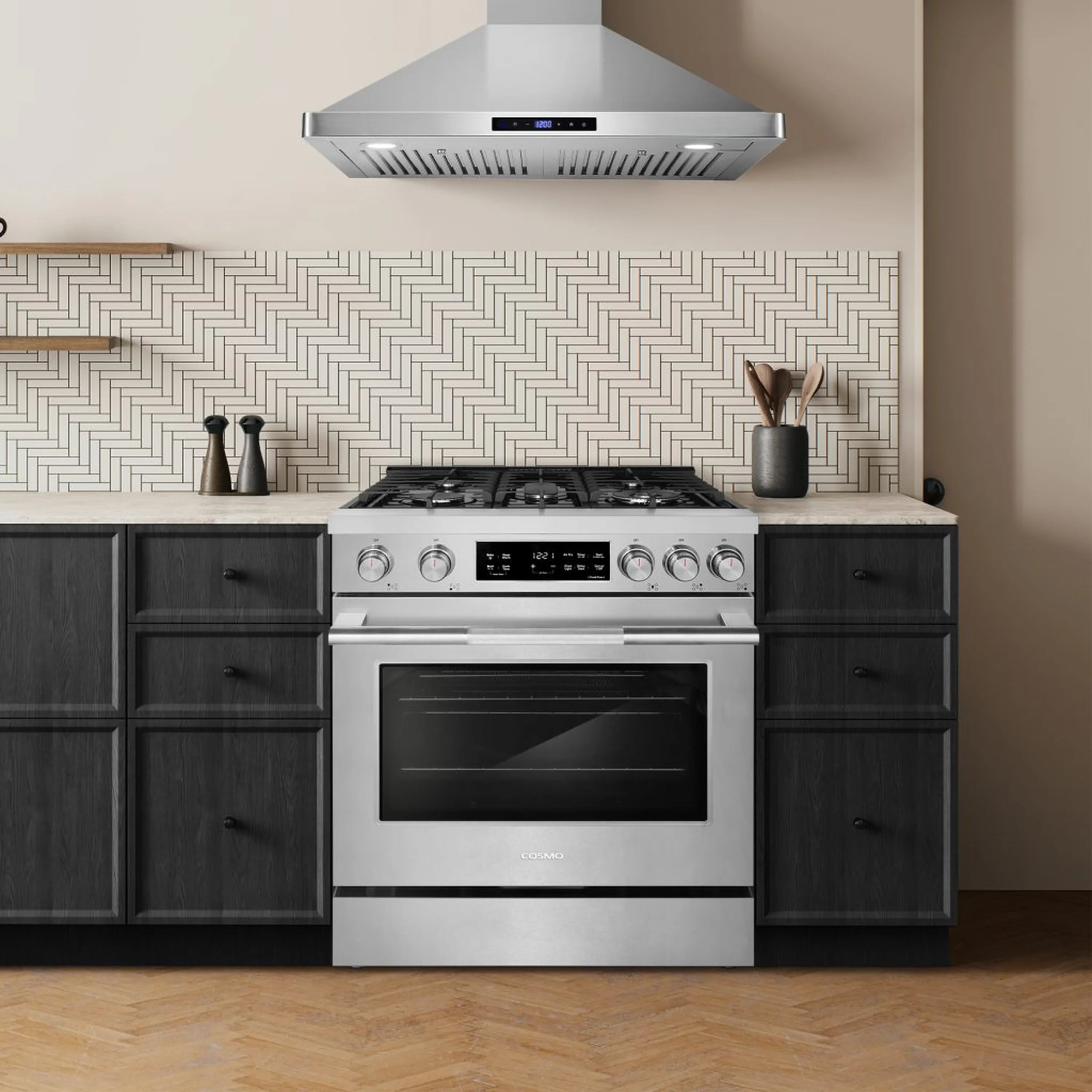 Stainless steel gas range in kitchen with oven window and front control panel