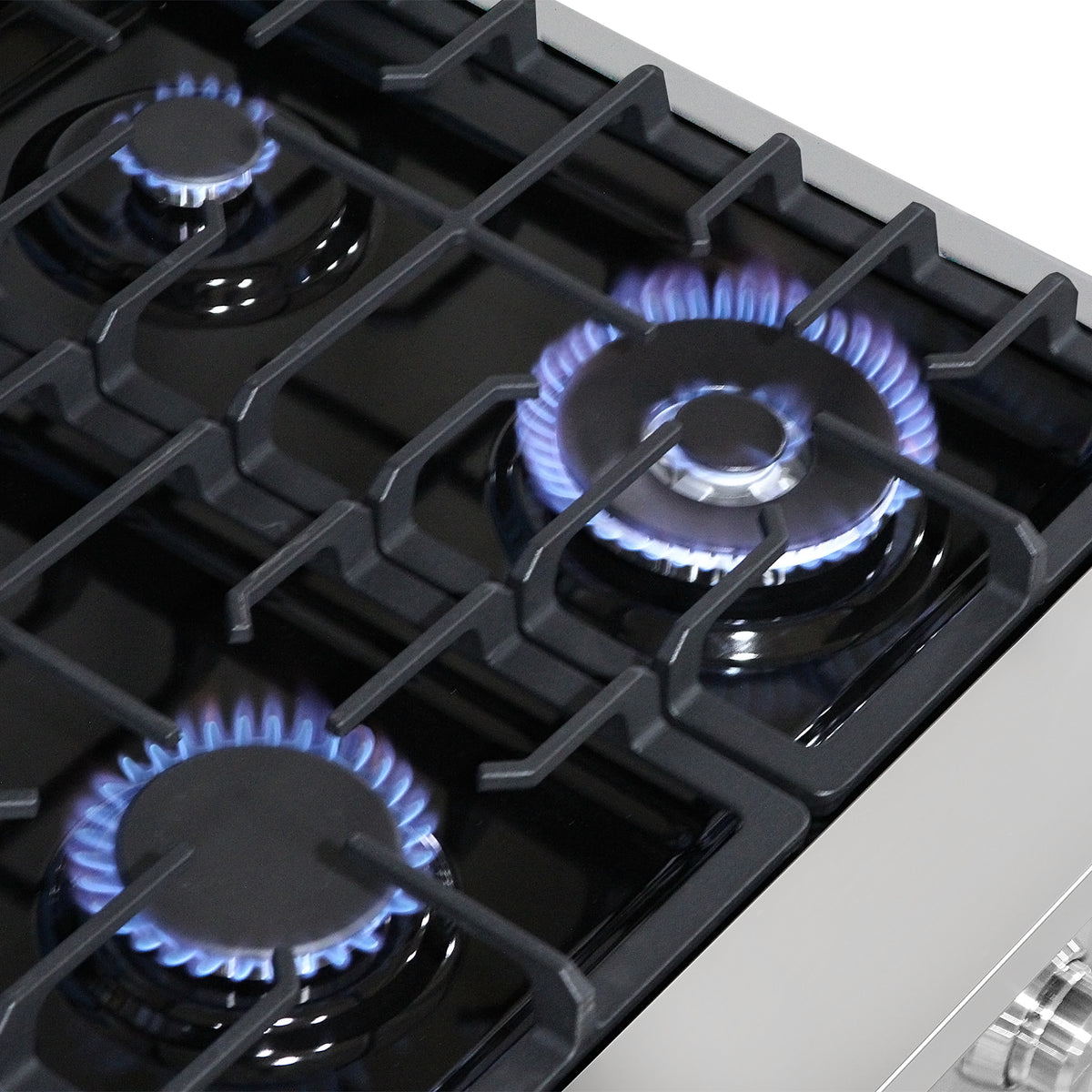 Close-up of the sealed gas burners on the Cosmo COS-RGS366SS range