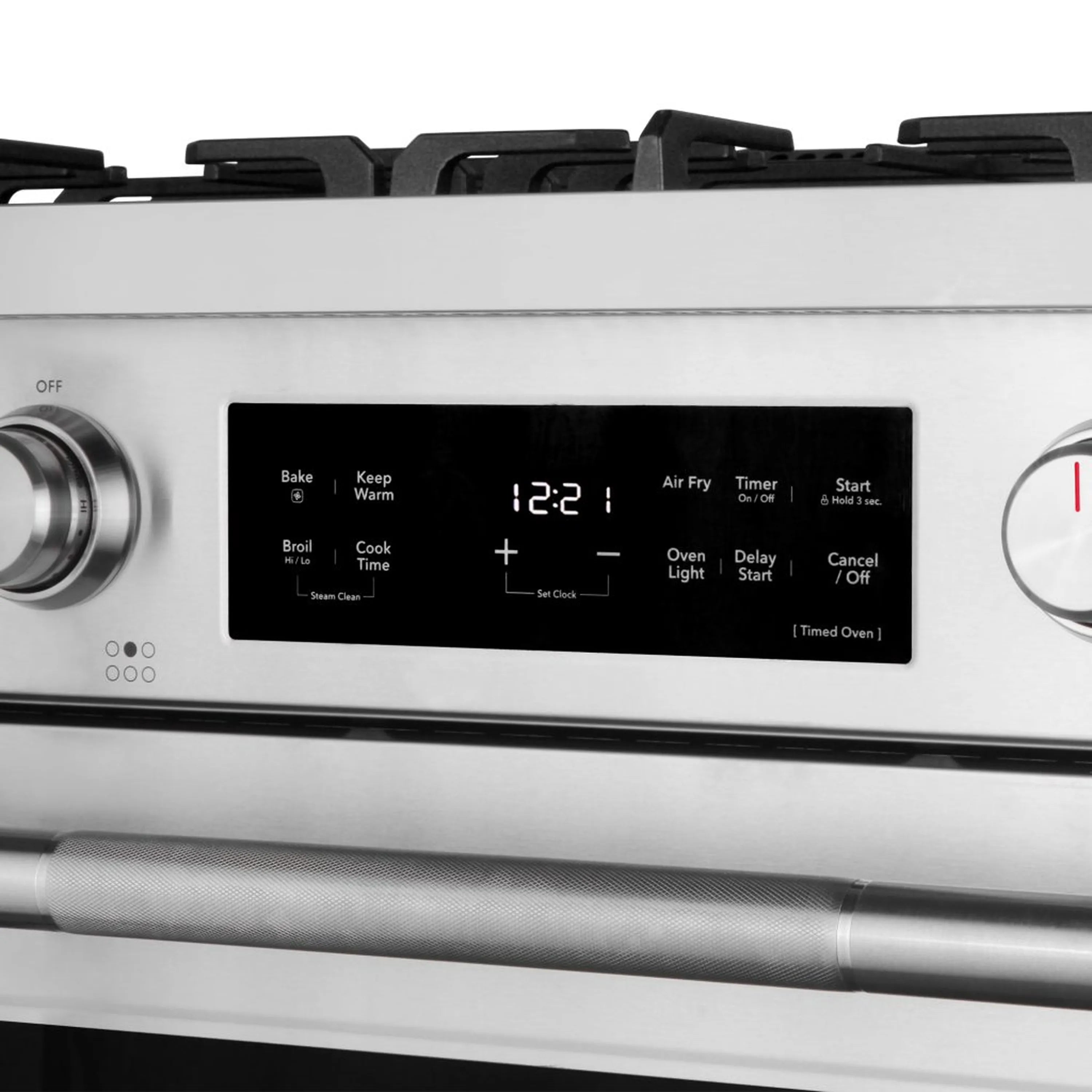Gas range control panel with digital display and stainless steel control knobs