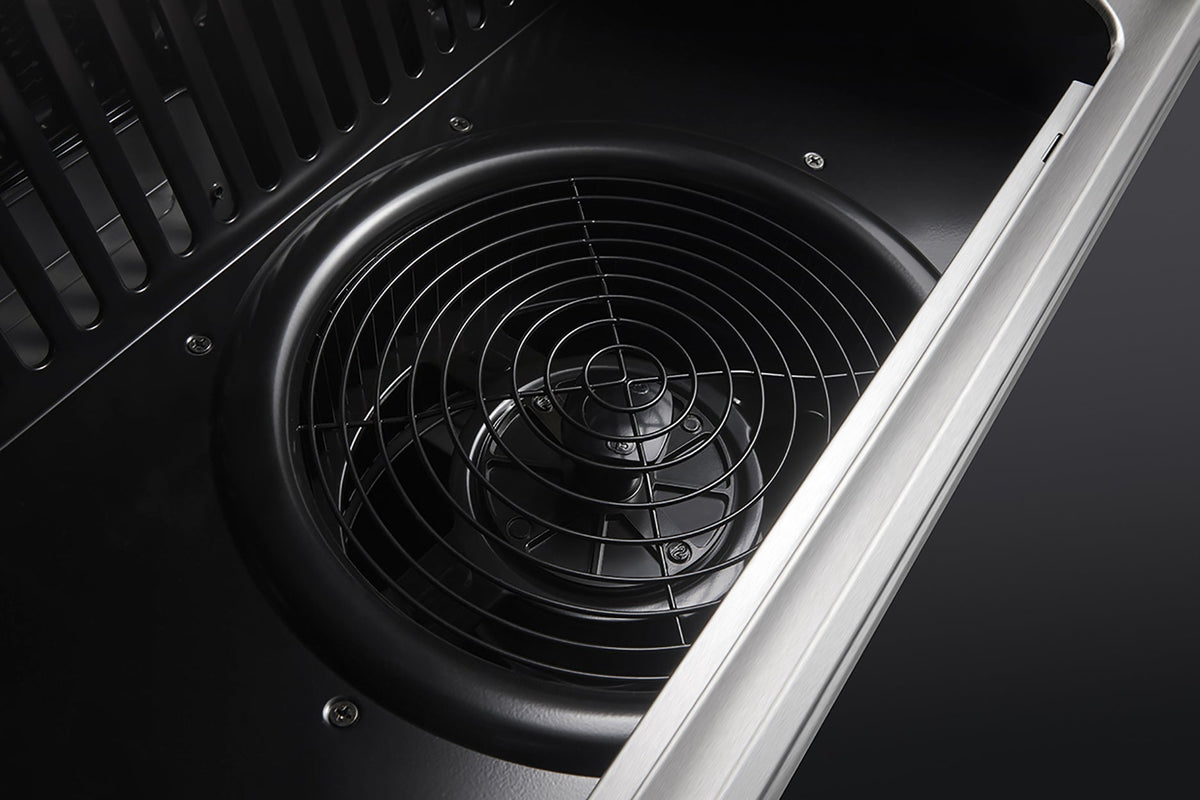 Range hood fan and circular duct inside the black filter housing