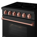 Black electric range with five cooktop burners, rose gold knobs, and copper oven handle