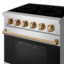 Stainless steel electric range control panel with bronze knobs and long brass oven handle