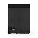 Black oven interior panel with vent holes and circular thermostat dial
