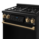 Black gas range cooktop with bronze knobs and digital tilt panel display