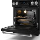 Black gas range with oven door open, bake rack and burner grates inside