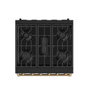 Black gas cooktop with four burners and bronze grates on top