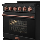 Black gas range with open oven door, lit interior, and rose-gold oven handle
