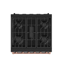 Black cooktop with four burners and grates, copper trim along the front