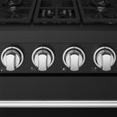 Black control panel with four silver gas knobs and burner indicator markings.