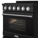 Black gas range with stainless trim, open oven door, and wire oven rack inside.